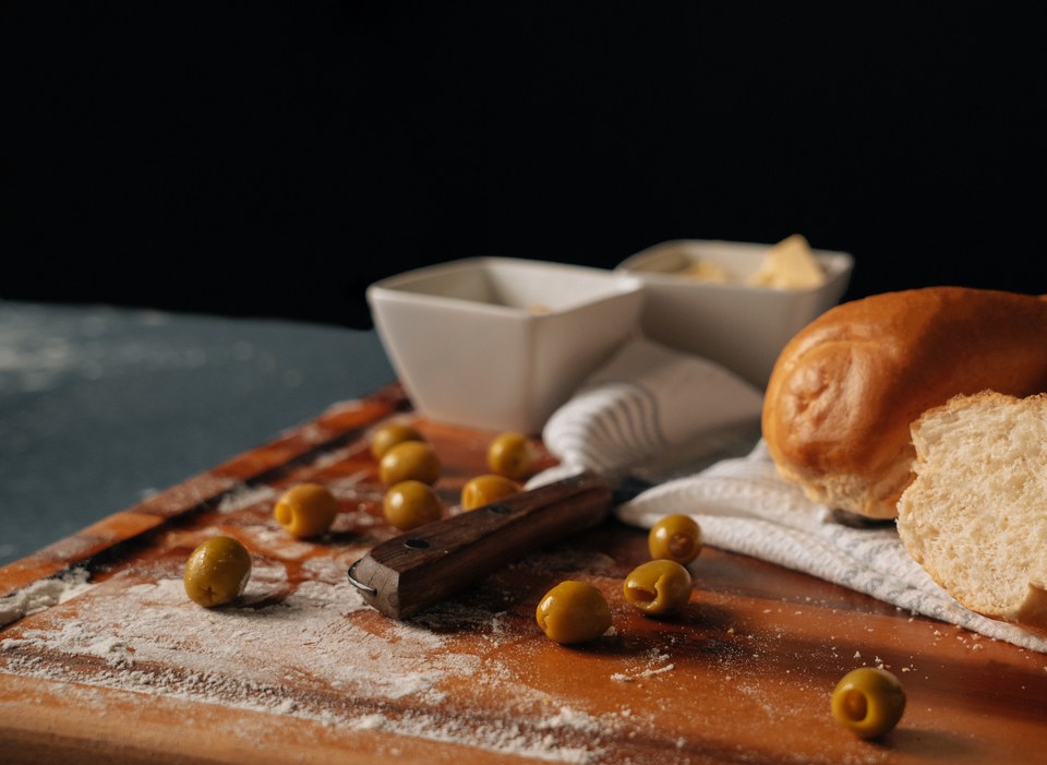 Sliced baguette with olives