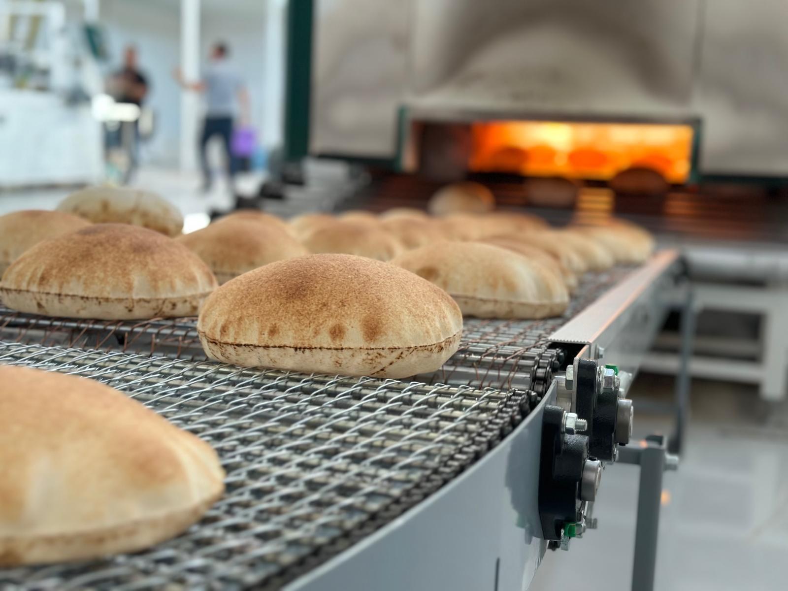 Fresh bread coming out of the oven